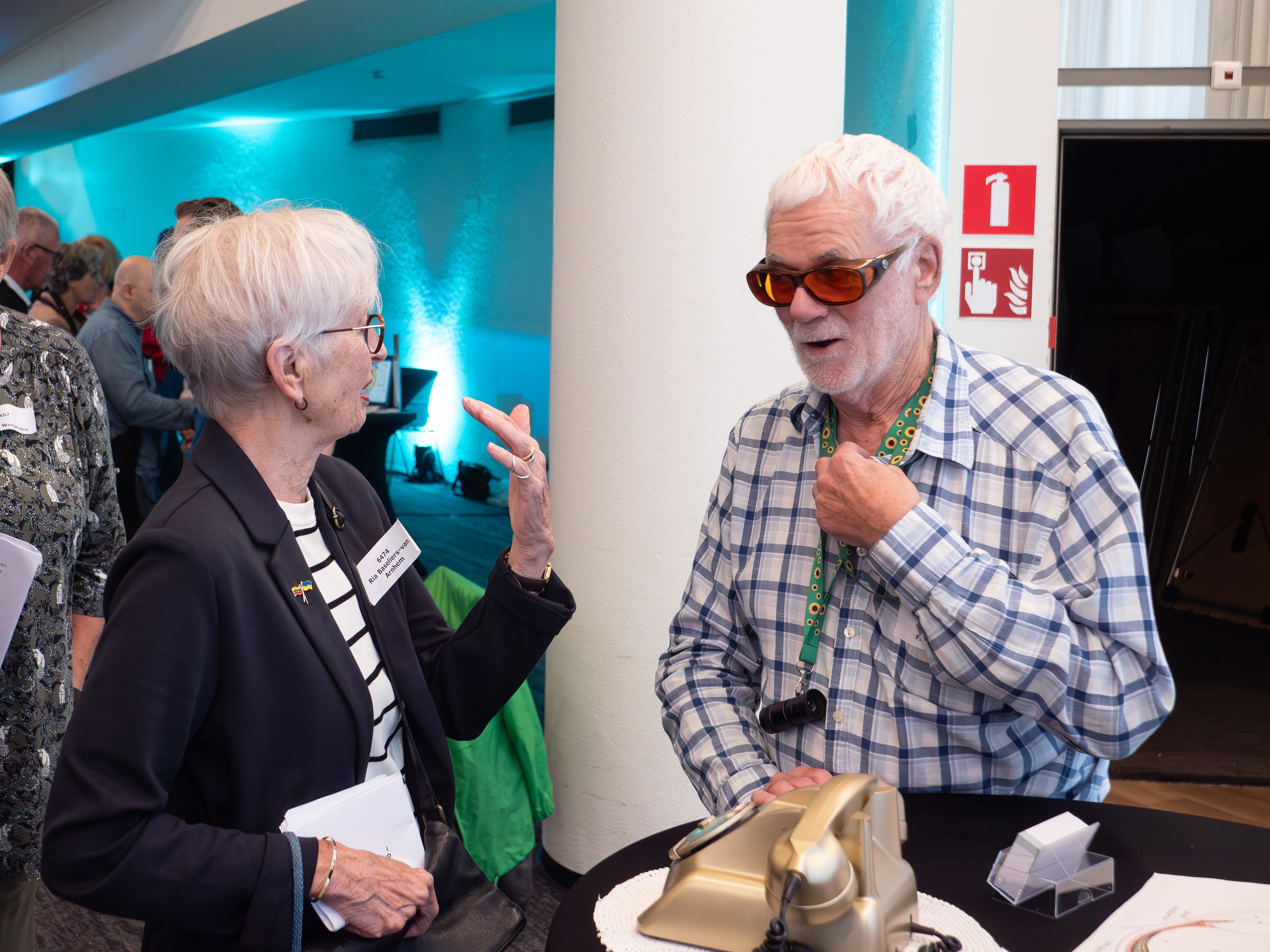 Twee mensen in gesprek op de Oog op Kennismarkt 2025
